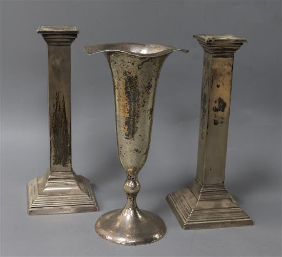 A pair of Gorham sterling silver candlesticks of Doric form and a Shreve & Co specimen vase,